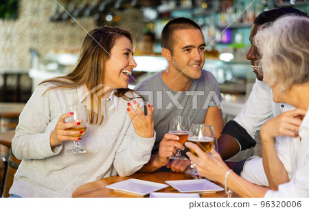 View on the young Latin couple talking 96320006