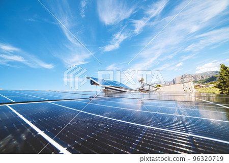 Renewable energy system with solar panel for electricity and hot water 96320719