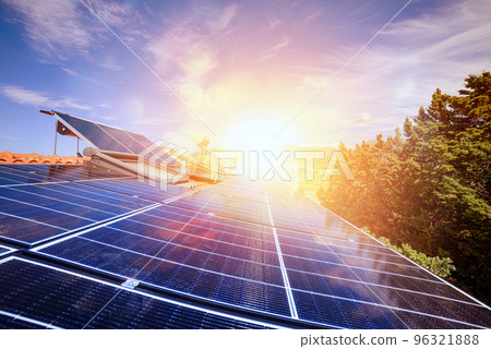 Renewable energy system with solar panel for electricity and hot water 96321888