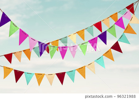 Background texture of garland flags hanging outdoors 96321988