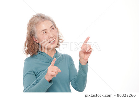 Senior woman pointing Senior woman pointing 96322260