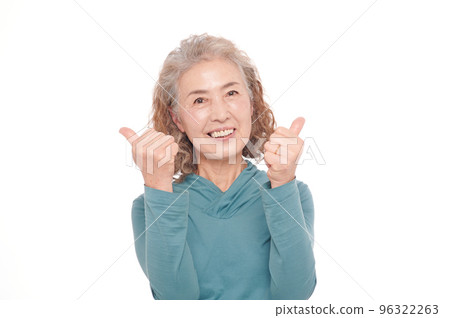 Senior woman giving a good sign Senior woman giving a good sign 96322263