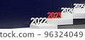 Illustration of three-dimensional numbers representing the year 2023 lined up on the stairs 96324049