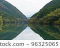 landscape reflected in the river 96325065