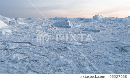 Climate Change and Global Warming. Icebergs from melting glacier in Ilulissat, Greenland. Arctic nature landscape affected by global warming. Sustainability concept 96327968