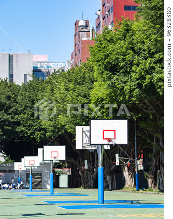Outdoor basketball court in school. 96328380