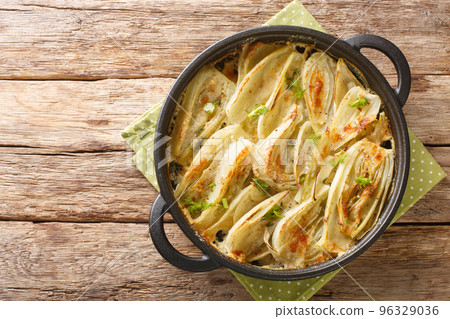 Italian food Parmesan Fennel Gratin closeup on the pan. Horizontal top view 96329036