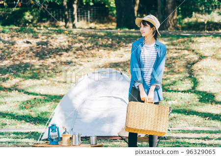 Woman doing outdoor fashion at camp 96329065