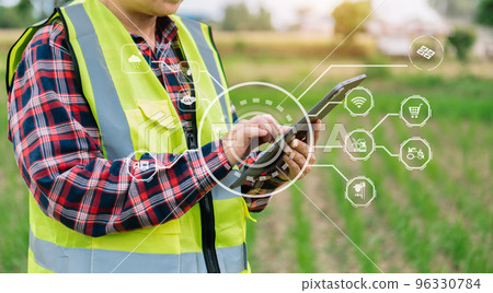 Smart farmer using application by smartphone concepts modern agricultural technology and visual icon. 96330784