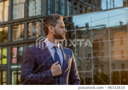 adult business man outdoor, copy space. business man in jacket. caucasian business man standing adult business man outdoor, copy space. business man in jacket. caucasian business man standing 96332610