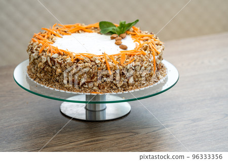 carrot cake with nuts and cream 96333356