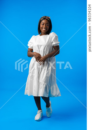 Full length portrait of a beautiful young african woman posing in photostudio Full length portrait of a beautiful young african woman posing in photostudio 96334104