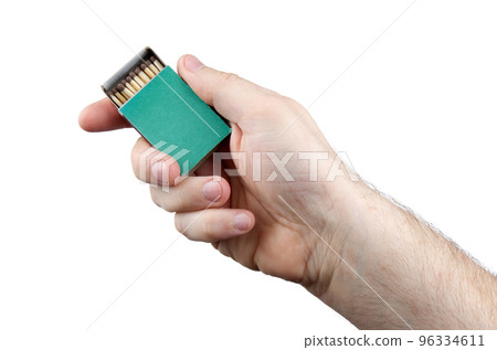 Close up ofhuman hands with open green matchbox isolated on white background with clipping path Close up ofhuman hands with open green matchbox isolated on white background with clipping path 96334611