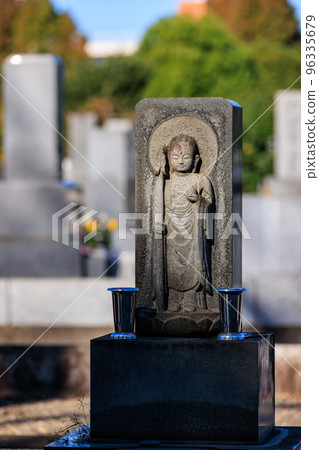 Jizo carved on a tombstone 96335679