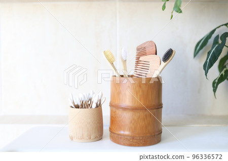 Eco firendly bamboo toothbrush and hair comb and cotton swabs Eco firendly bamboo toothbrush and hair comb and cotton swabs 96336572