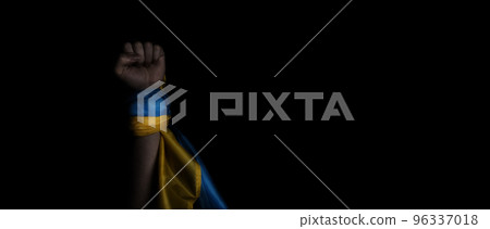 Russian flag and Ukrainian flag on a black background. Russian flag and Ukraine flag in hands showing symbol of struggle war political struggle political expressions Civil wars and territory conflict. 96337018