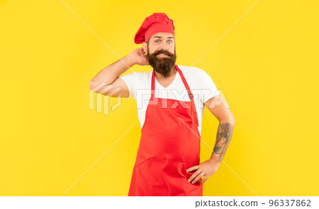 Hesitant man in red toque and apron scratching head yellow background, cook Hesitant man in red toque and apron scratching head yellow background, cook 96337862