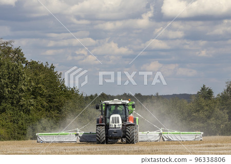a tractor preparing the field 96338806