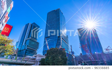 Tokyo cityscape in Japan Five Shibuya buildings are stepped together. Sakuragaoka redevelopment building shining in sunlight will soon be completed 96338885
