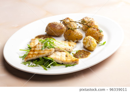 grilled fish with grilled potatoes 96339011