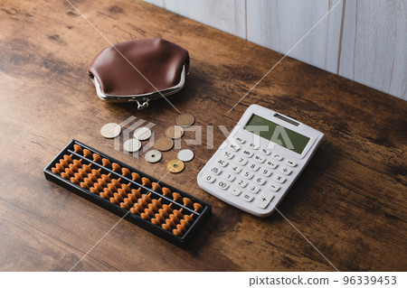 US dollar banknotes and calculator 96339453