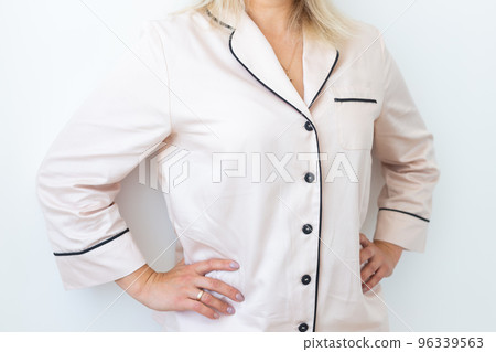 Close-up detail and fabric texture of a pajama. Homewear, sleepwear, shopping and sale 96339563