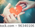 Male and female hands repairing a broken heart. Divorce concept. Love concept 96340106