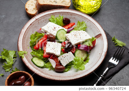 Greek salad with vegetables and feta cheese 96340724