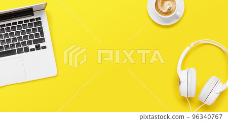 Laptop, coffee cup and headphones 96340767