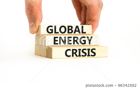 Global energy crisis symbol. Concept words Global energy crisis on wooden blocks. Businessman hand. Beautiful white table white background. Business and global energy crisis concept. Copy space. 96342882