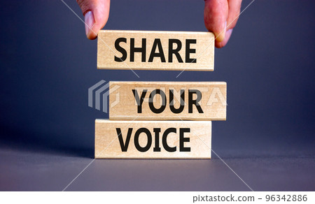 Share your voice symbol. Concept words Share your voice on wooden blocks. Businessman hand. Beautiful grey table grey background. Business share your voice concept. Copy space. Share your voice symbol. Concept words Share your voice on wooden blocks. Businessman hand. Beautiful grey table grey background. Business share your voice concept. Copy space. 96342886