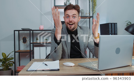 Happy amazed businessman shocked by sudden victory, game winning, lottery goal achievemen, good news 96343903