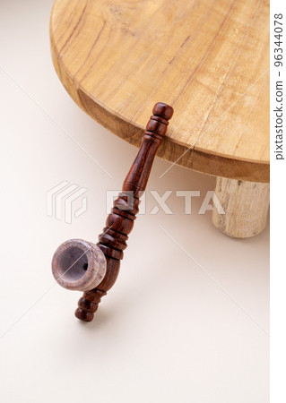 Tobacco pipe isolated, smoking wooden pipe closeup Tobacco pipe isolated, smoking wooden pipe closeup 96344078