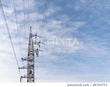 Concrete electric pole with wires against the sky 96344755