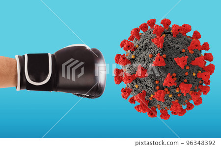 Punch with boxing glove hits the virus on cyan background Punch with boxing glove hits the virus on cyan background 96348392