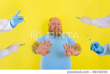 Fat doubter man has doubts about covid-19 vaccine 96348394