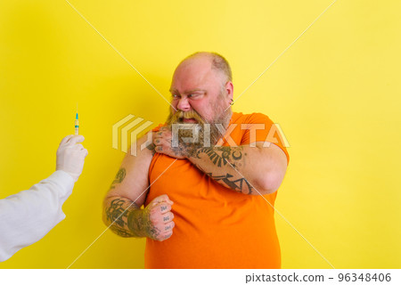 Doubter man is afraid of getting the covid-19 vaccine 96348406
