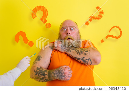 Fat doubter man has doubts about covid-19 vaccine Fat doubter man has doubts about covid-19 vaccine 96348410