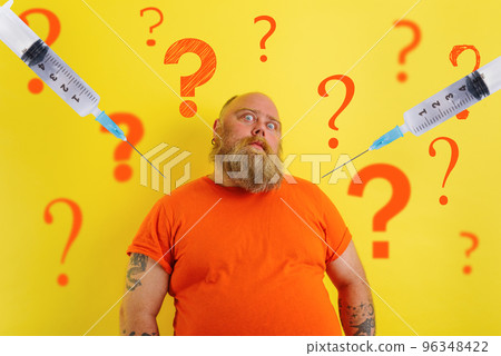 Fat doubter man has doubts about covid-19 vaccine Fat doubter man has doubts about covid-19 vaccine 96348422