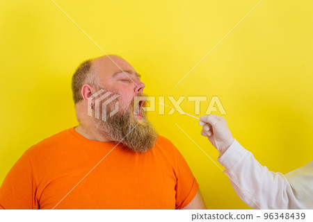man with beard and tattoos does the covid-19 test man with beard and tattoos does the covid-19 test 96348439