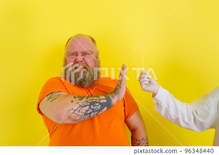 Afraid man is afraid to get covid19 test Afraid man is afraid to get covid19 test 96348440