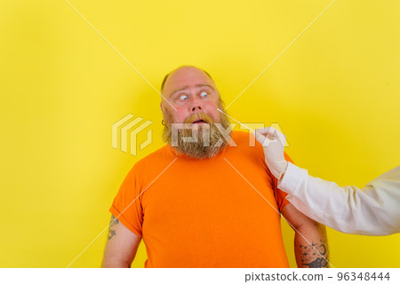 Afraid man is afraid to get covid19 test Afraid man is afraid to get covid19 test 96348444