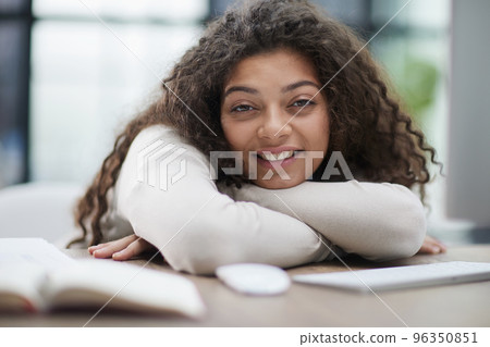 Tired overworked woman resting at workplace in office 96350851