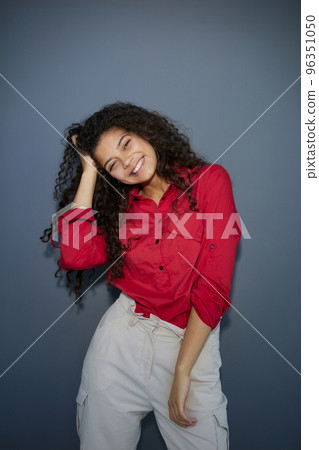 Close up view. Beautiful girl sincerely smiling on a gray background 96351050