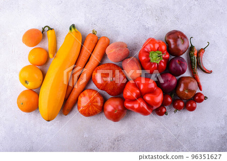Yellow and red vegetables and fruits 96351627