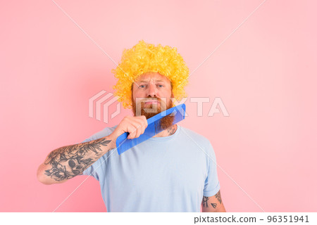 Thoughtful man with beard, yellow peruke and big comb 96351941