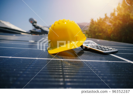 Renewable energy system with solar panel on the roof 96352287