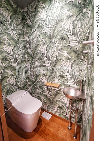 Toilet with colorful wallpaper 96353616