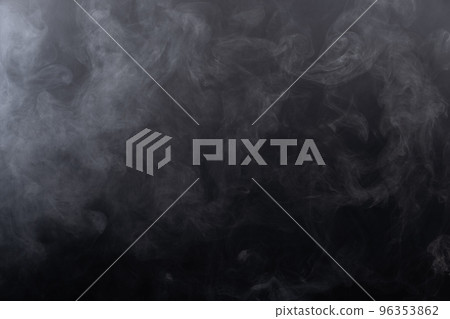 Dense Fluffy Puffs of White Smoke and Fog on black Background, Abstract Smoke Clouds, Movement Blurred out of focus. Smoking blows from machine dry ice fly fluttering in Air, effect texture 96353862