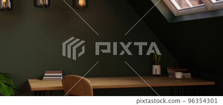 Copy space on wood tabletop with decor against the stylish green wall in modern attic room Copy space on wood tabletop with decor against the stylish green wall in modern attic room 96354301